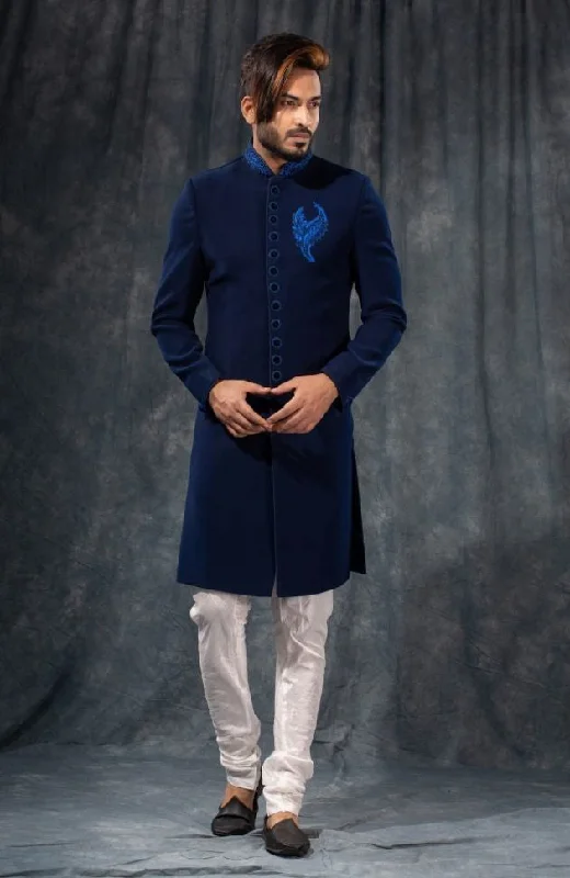 Custom-made dresses for personalized fitsBlue and White Color Velvet Sherwani - Rent