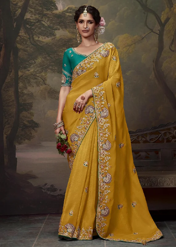 Beach dresses for casual outingsYellow Fancy Fabric Embroidered Festive Saree
