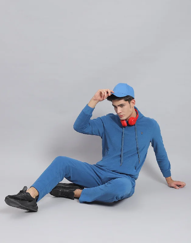 men's moisture-management shirtsMen Blue Solid Hooded Full Sleeve Tracksuit