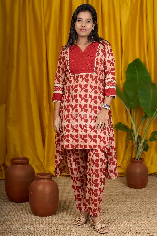 High-slit dresses for womenMaroon Batik Printed Cotton Flared Kurtha with Lace Detailing and Comfortable Fit for Women