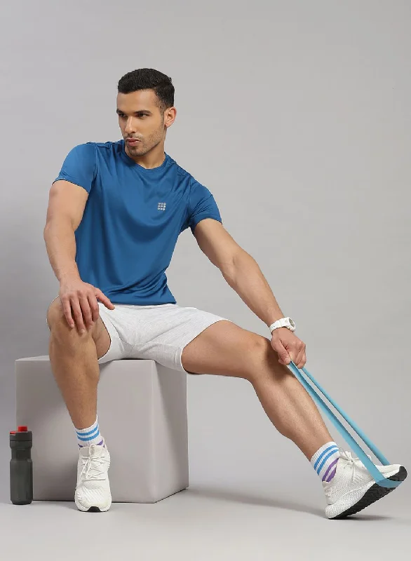 men's short-sleeved clothing with a stretch fabric for comfortMen Teal Blue Solid T-Shirt