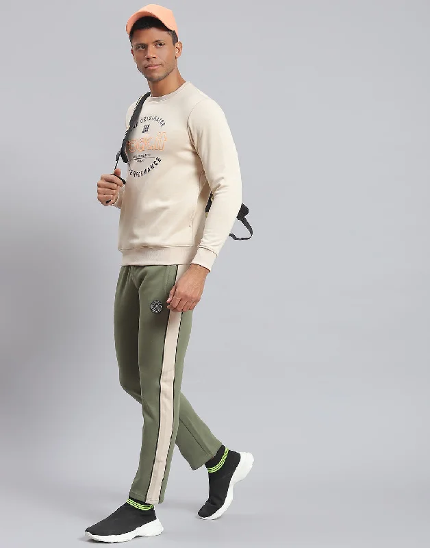 men's lightweight sports shirtsMen Beige Solid Round Neck Full Sleeve Sweatshirt