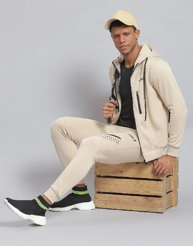 men's gym shirtsMen Beige Solid Hooded Full Sleeve Tracksuit