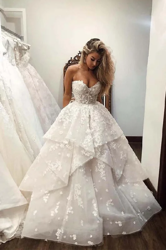 Statement dresses for making a fashion statementRoycebridal Ivory Tulle Ball Gown Strapless Sweetheart Wedding Dresses With Flowers, MW643